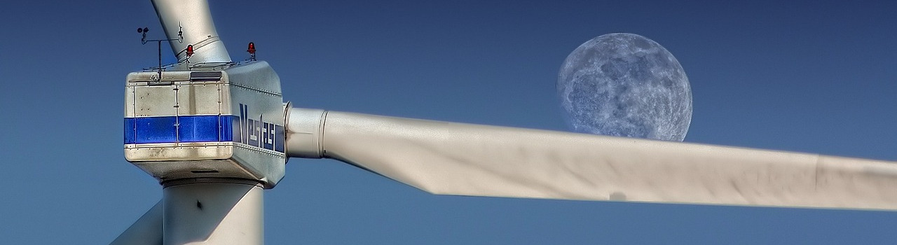 Wind generator in front of the moon