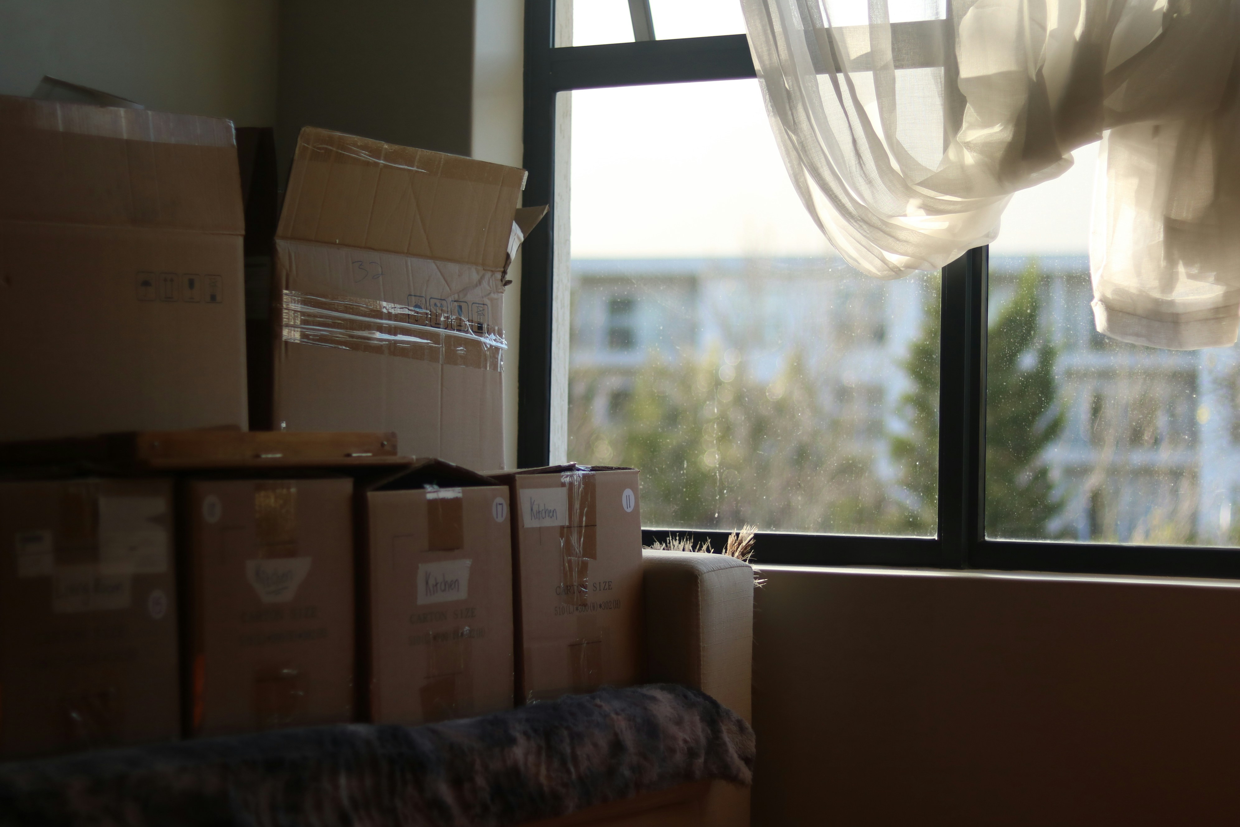 Moving boxes by a window