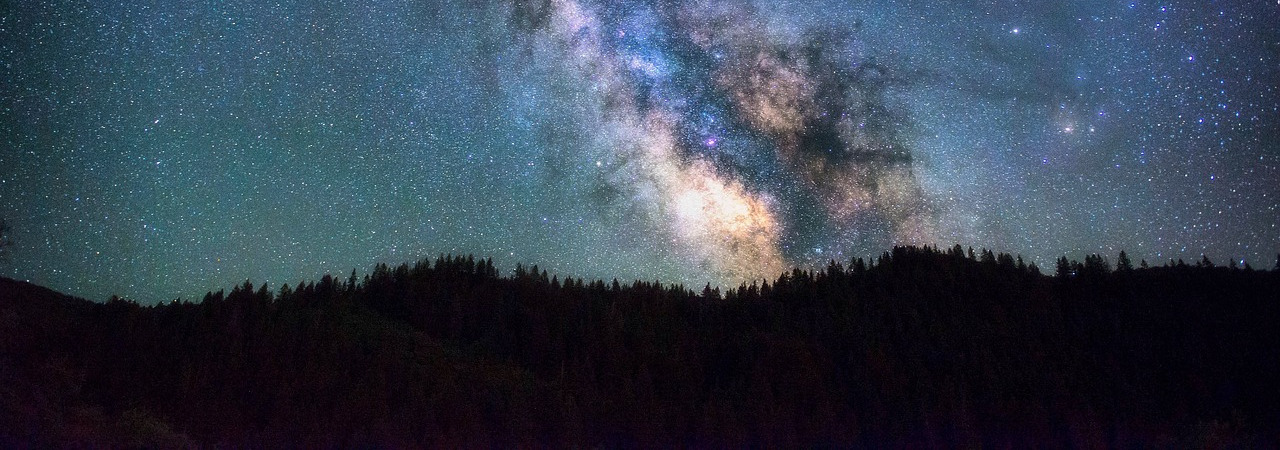 Milky Way galaxy over mountains