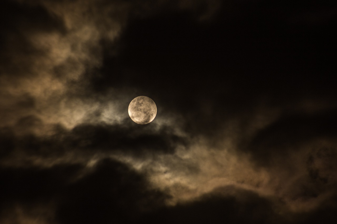 Full Moon Among Dark Clouds
