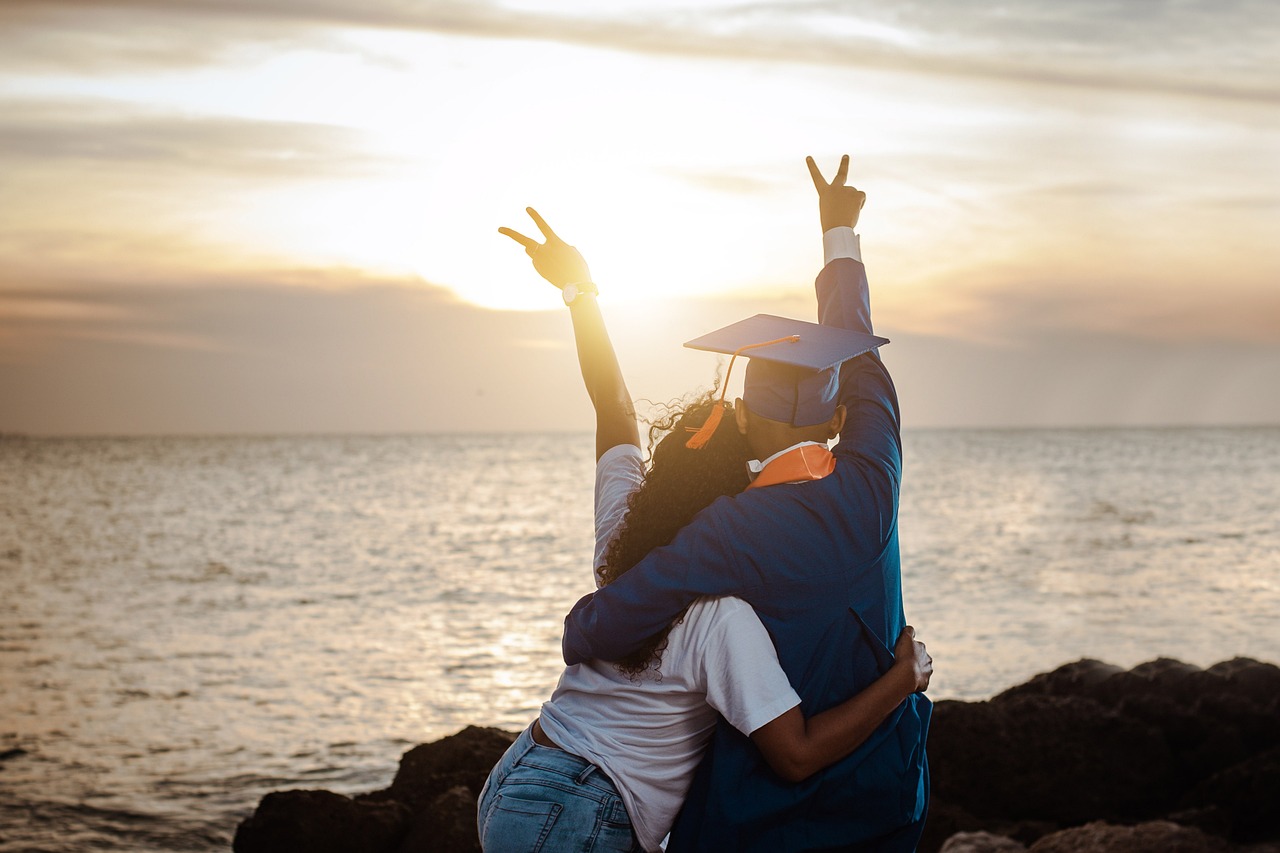 Graduates Celebrating by the Sea